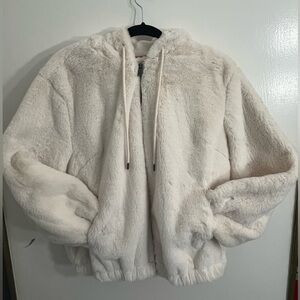 Cream faux fur zip up jacket with hood size M